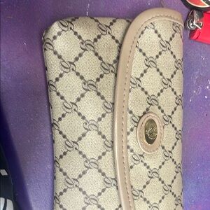 Cream and Brown Geometric Clutch with Structured Design